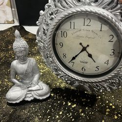 Buddha Statue And Clock
