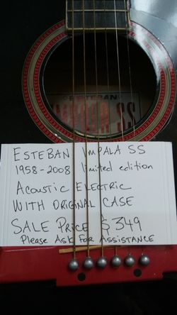 Impalla as acoustic. Electric. Guitar