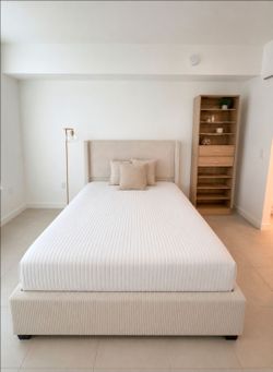 Queen sized bed and mattress