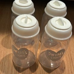 Assorted Baby Bottles and Milk Storage