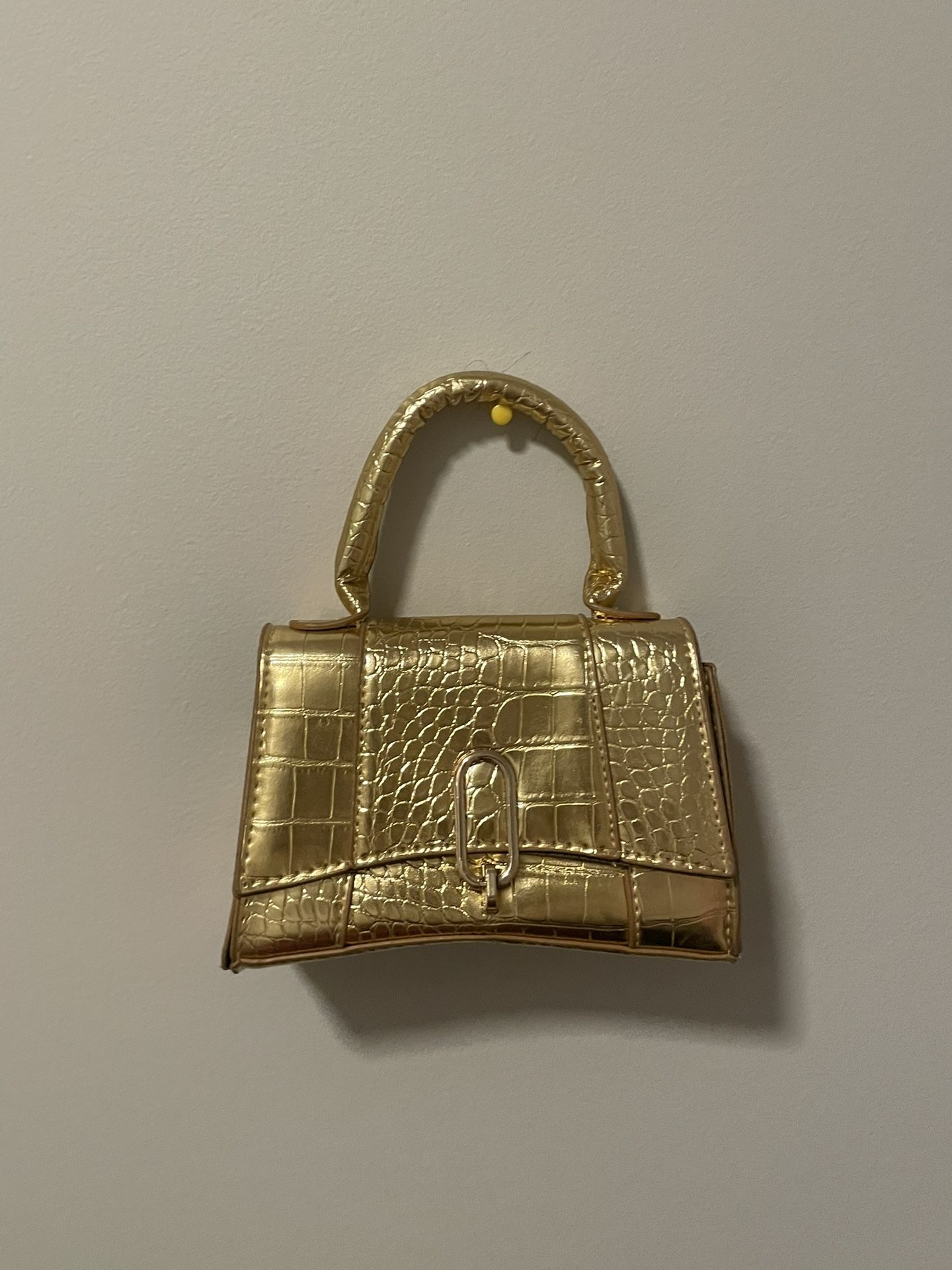 Gold croc leather hand bag