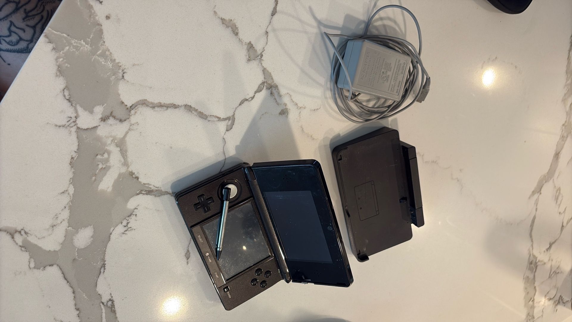 Used black Nintendo 3Ds with stylus and charger