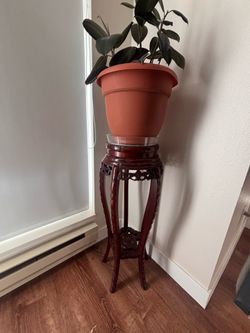 Rosewood plant stand w/ marble top.
