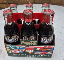 Vintage Six Pack of 8 Oz. Original Coca-Cola from the 1996 Centennial Olympic Games $25. Pick-up In Aurora.