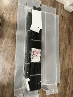 Queen metal base with storage space.