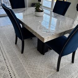 Pure White Marble Dining Table with 4 Royal Blue Chairs and Blue/White Carpet