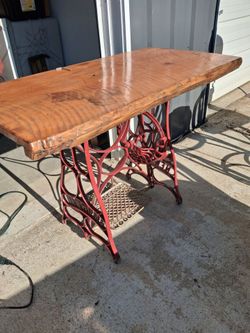 Antique sewing machine table with slab