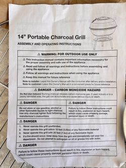 Portable charcoal grill