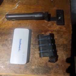 One Tripod ,Two Mobile Battery Charger/and Recharge Cable 
