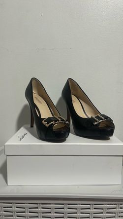 Nine West "Celestine" peep-toe stiletto pumps.