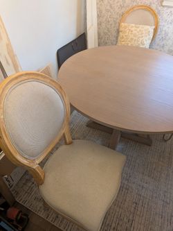 4' round table and 4 chairs