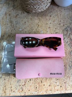 Miu Miu Glasses