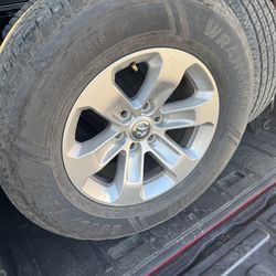 RAM 1500 18” stock rims w/ wrangler workhorse tires