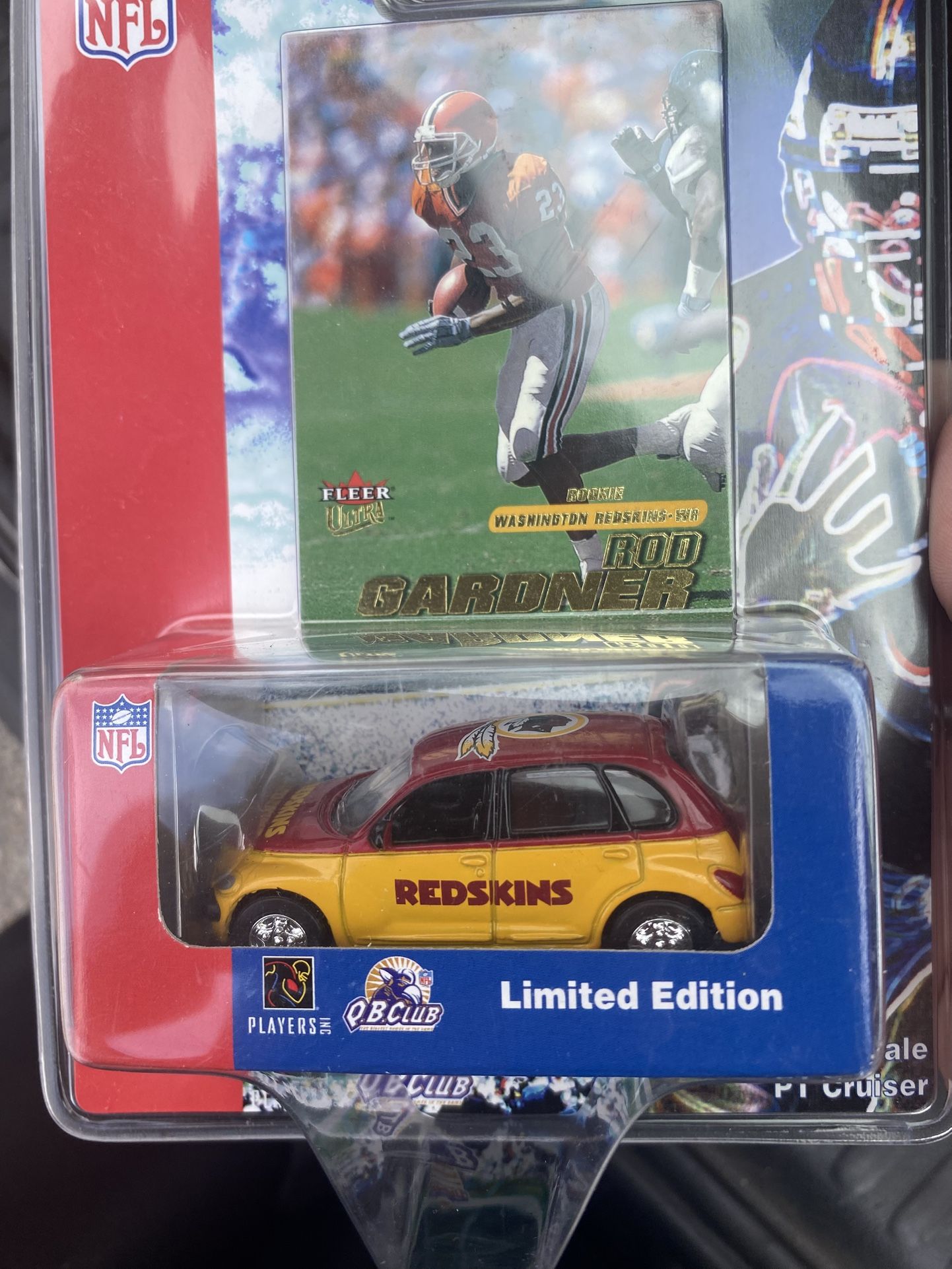 This is a limited edition NFL Washington Redskins PT Cruiser die-cast collectible car, which includes a Fleer Ultra football card of Rod Gardner.