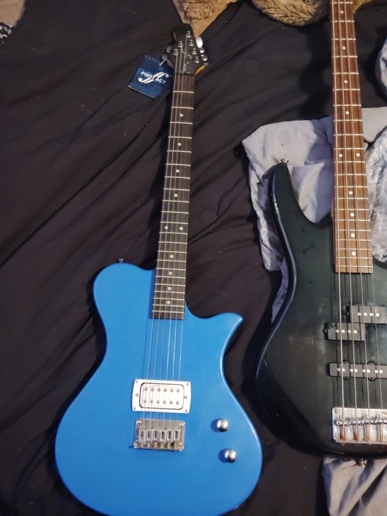 One Is Guitar And The Black One Its A Bass