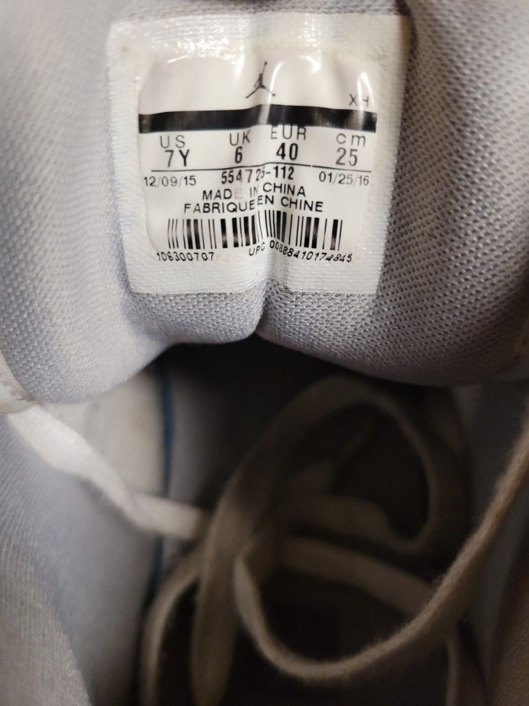 White Nike Air Jordan 1s