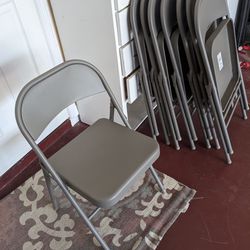 steel folding chairs. total 8