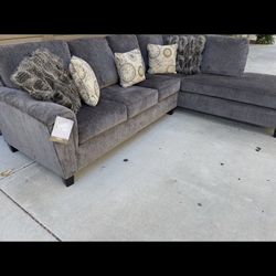 Sectional Couch, Brand New With Tags From Ashley's Furniture. No Stage Ribs Burns No Defects.