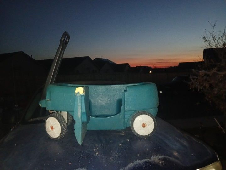 Green Pull Wagon 2seater. Excellent Condition Does ND A Wipe Down. Dusty.$15 O.B.O..