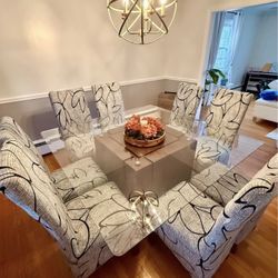 This must go, make an offer! Glass Table and 8 Chairs for Sale as a set.