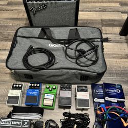 Guitar Pedal Board And Amplifier