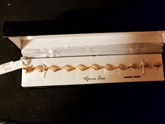LADIES TENNIS BRACELET.