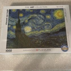 NEW  1000-piece jigsaw puzzle featuring Vincent van Gogh's "The Starry Night"