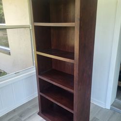 Brown Stand With Shelves