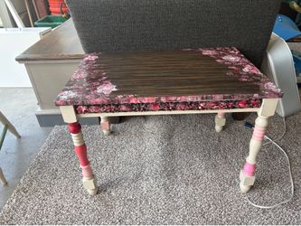 Wooden coffee/side table with floral pink patterns