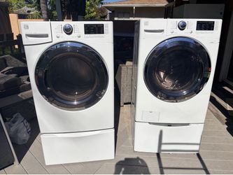 Kenmore elite washer, dryer, extra actual pedestal washer, and pedestal under dryer. Paid $3,000 +