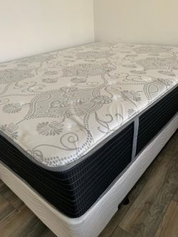 New queen mattress and box spring 2 pc bed frame is not included