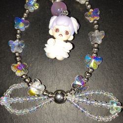 Pens, keyrings, purse/phone charms