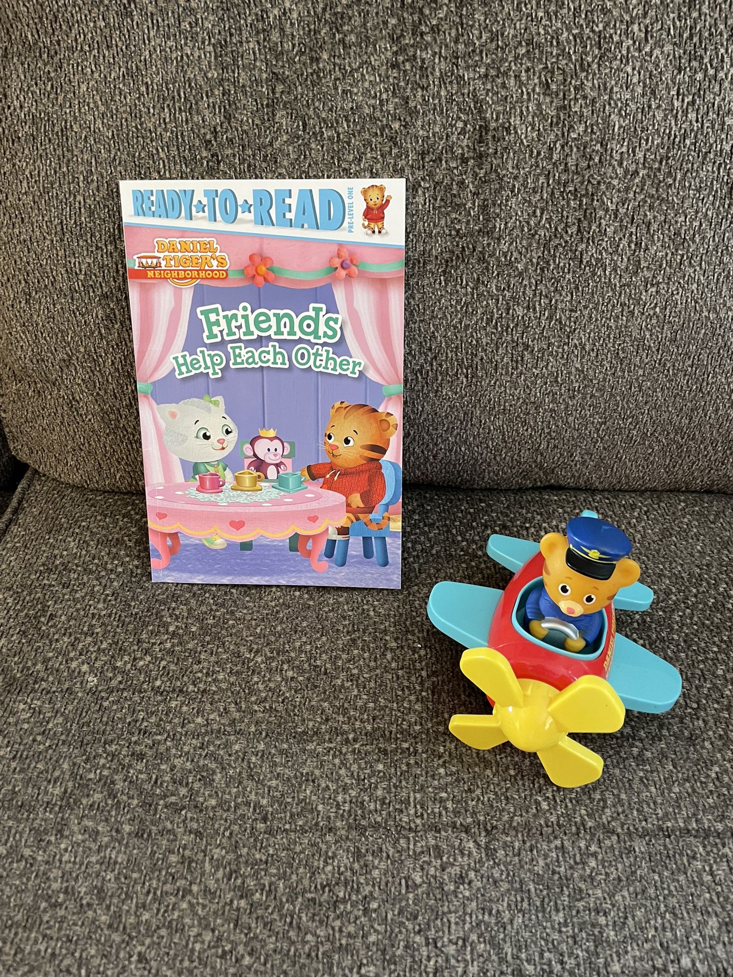 Daniel tiger airplane pull back and go toy with book