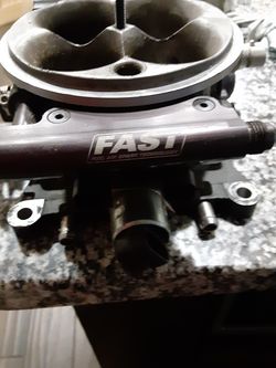 Fast four barrel throttle body