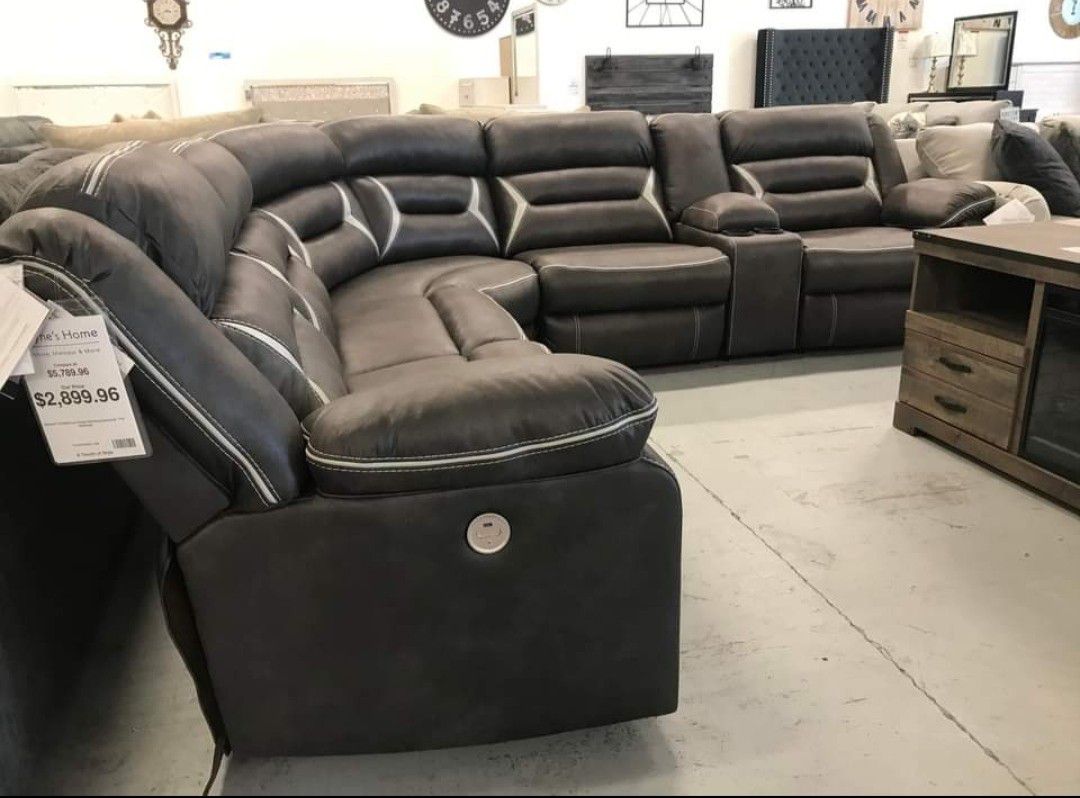 Kincord Midnight Black 4-Piece Power Reclining Sectional by Ashley 