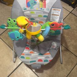 Bright Starts Playful Paradise Vibrating Baby Bouncer with Toys 
