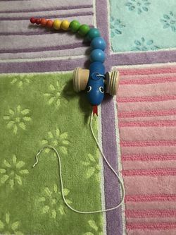 Wooden pull-along snake toy