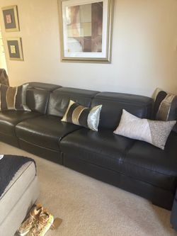 Navy blue, leather couch. 9.5ft long ,3.2ft wide
