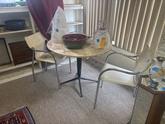 Round Stone Tabletop with MCM Base Table and Two MCM Dining Chairs