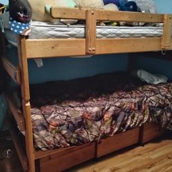 Solid Wood Bunk Bed With Three Roll Out Under Bed Drawers