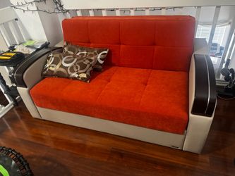 convertible sleeper sofa/loveseat with built-in storage.