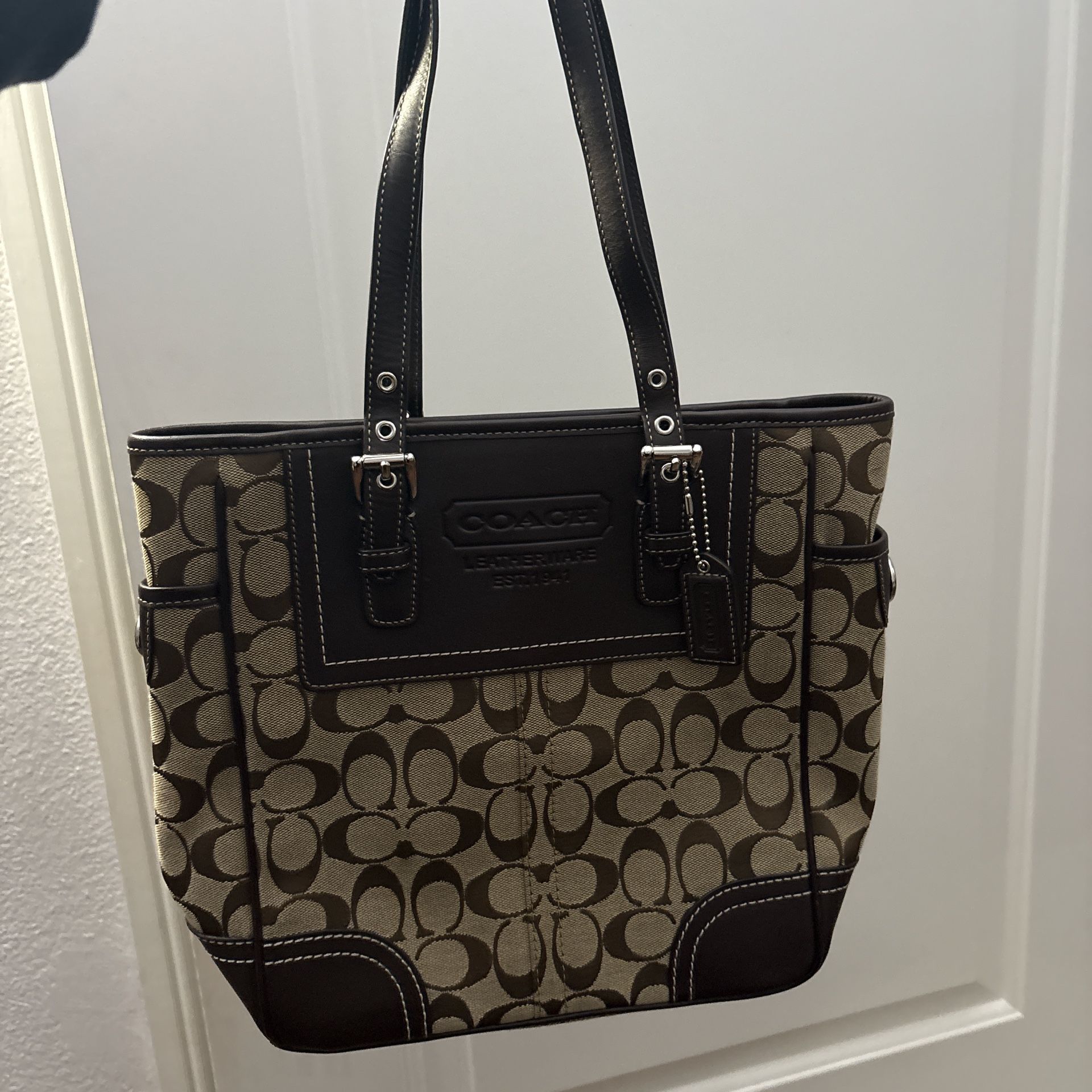 Coach brown and black signature monogram tote bag