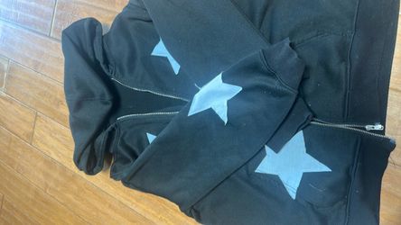 Size https://offerup.com/redirect/?o=TGFyZ2UuYmxhY2s= jacket with blue stars