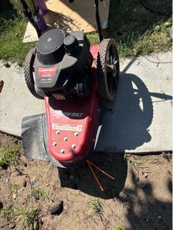 String trimmer walk behind Troy bilt