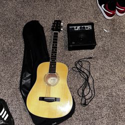 Guitar With Amplifier and Amp Cord ($50⬇️)