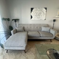 Grey couch with reversible chaise