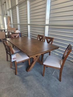 Bayside Furnishings
Bryce Dining Table and 6 Chairs
Constructed from Rubberwood and Poplar Solids with Walnut Veneers
Integrated Self-Storing Butterfl