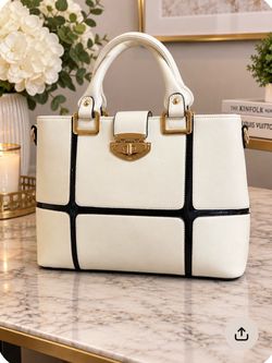 Kathy Van Zeeland. White leather handbag with black trim and gold hardware #handbag #leather used like new