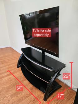A complete home entertainment set(TV+Stand)