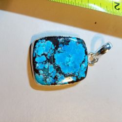 Turquoise On Silver Pendant 